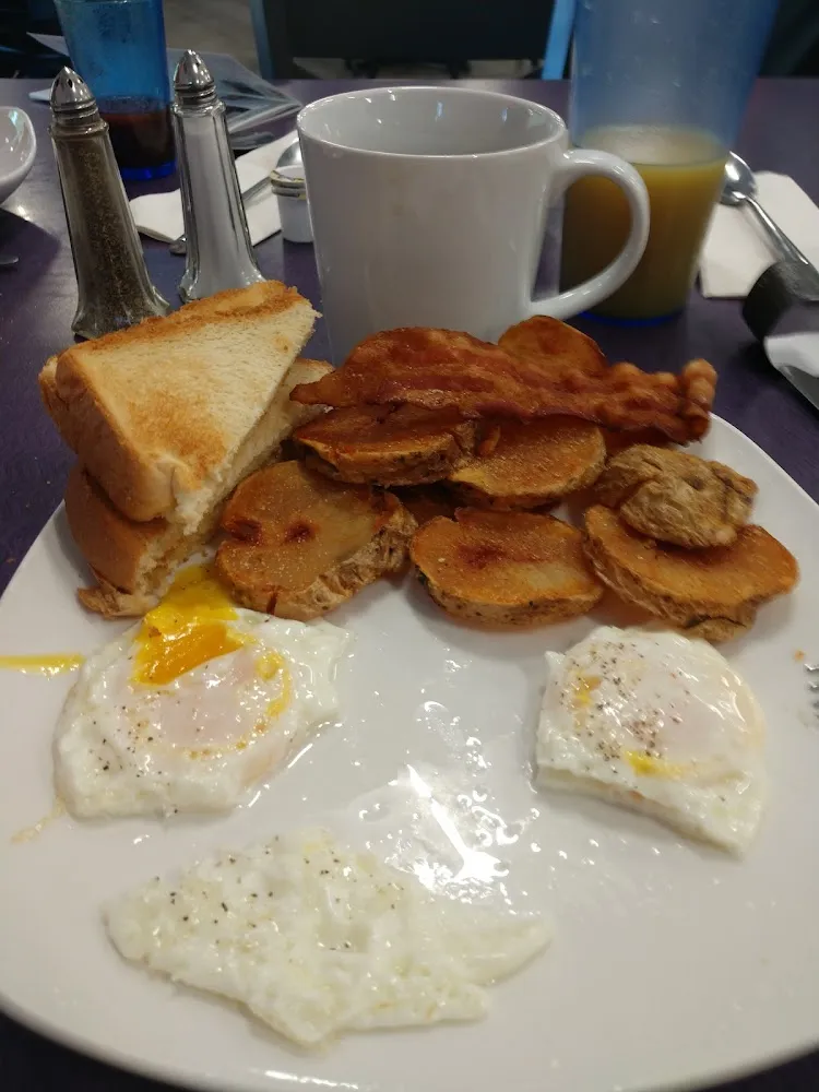Two Eggs over Easy with Bacon and American Fries